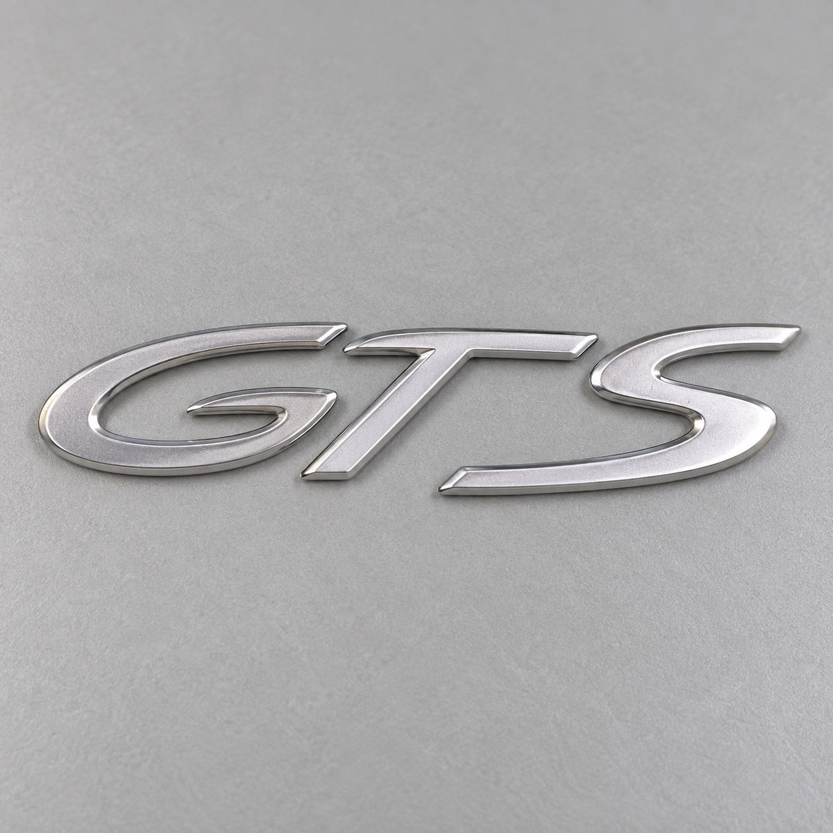 Silver-coloured aftermarket GTS badge set