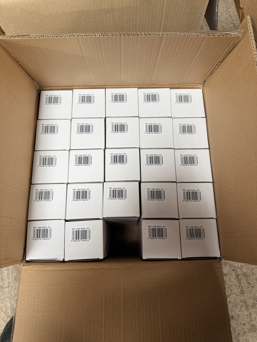 Open carton showing individually boxed Golf Addict bottles, barcode 5060578094233