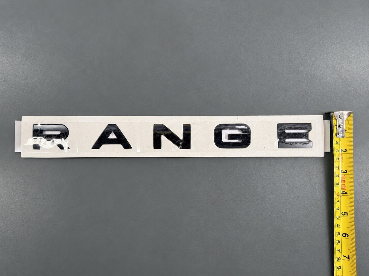 Gloss black aftermarket Range Rover lettering set on fitting stencil