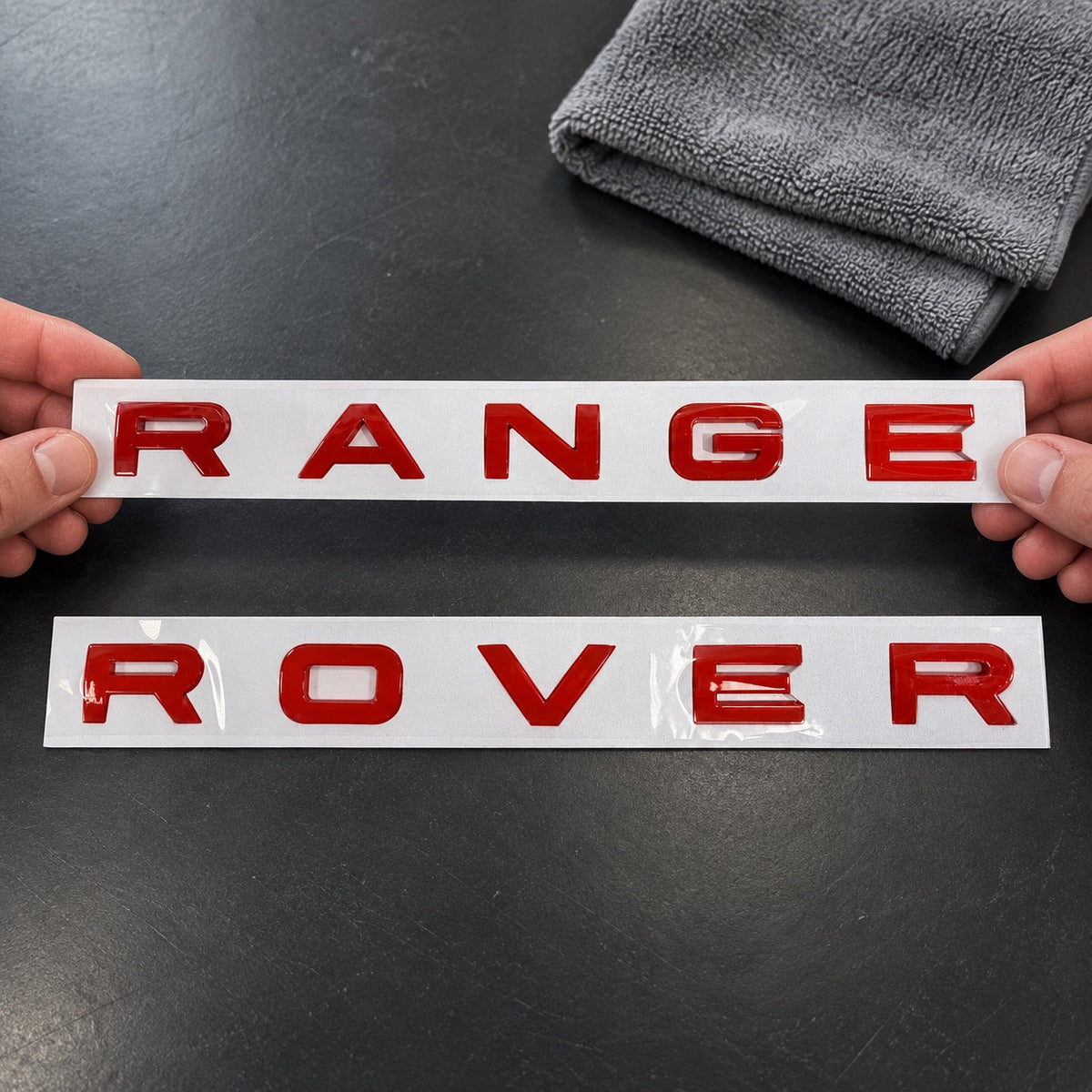 Gloss red aftermarket Range Rover lettering set on fitting stencil