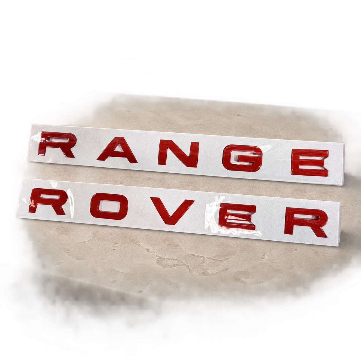 Gloss red aftermarket Range Rover lettering set on fitting stencil