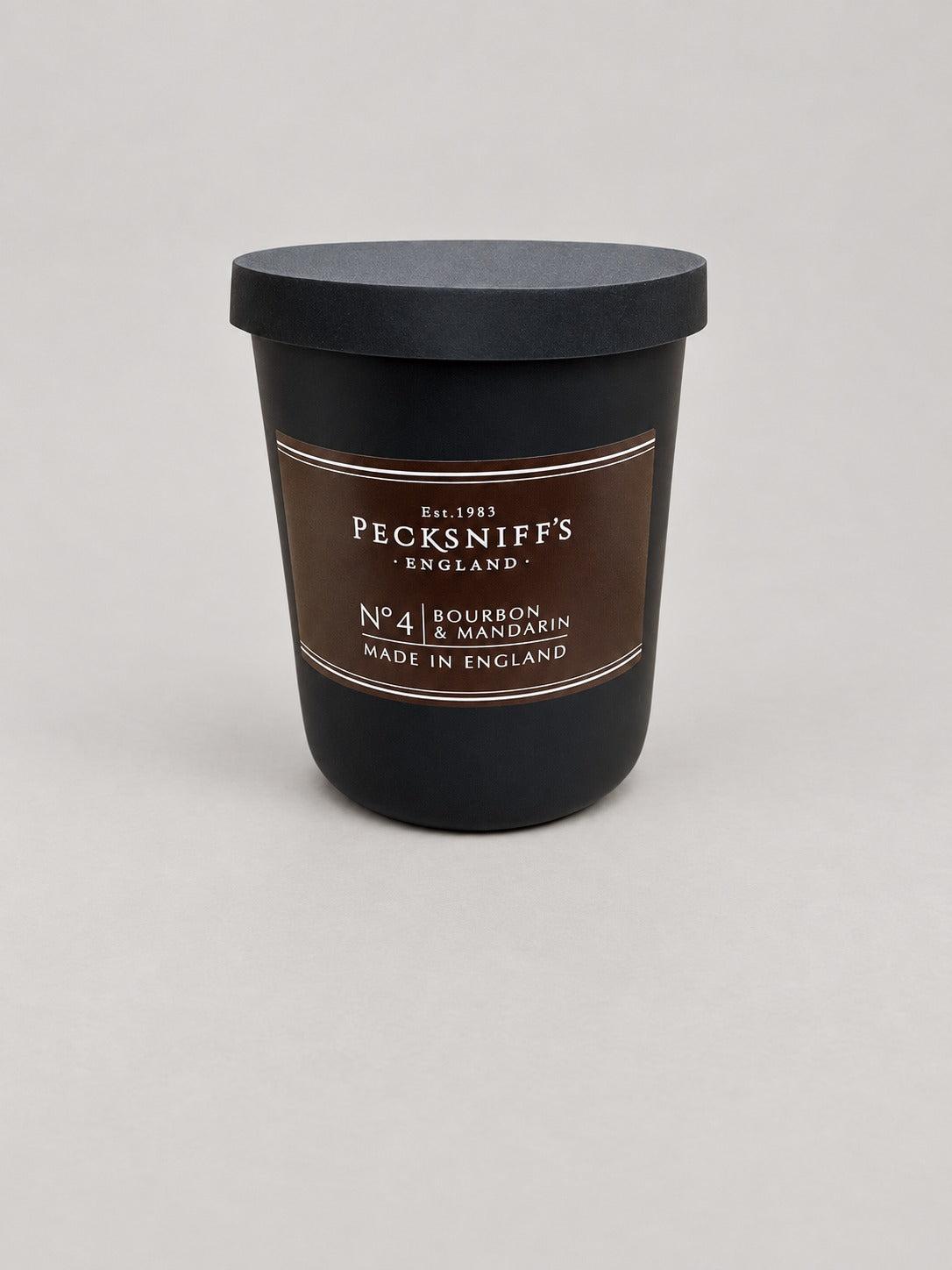 Pecksniff's No.4 Bourbon & Mandarin candle 100g – studio photo