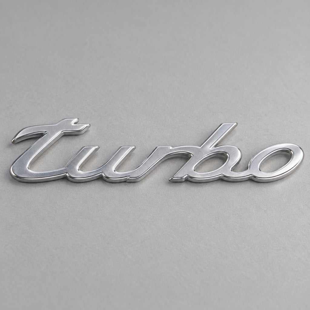 Silver-coloured aftermarket turbo script badge